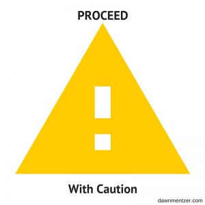 Proceed with caution symbol: yellow triangle with white exclamation point in middle